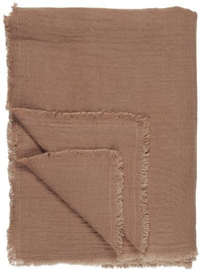 Soft brick-colored plaid with subtle double weave and fringed edges, ideal for einzigartig Wohndeko and individueller Stil. - Plaid doppeltgewebt ziegel
