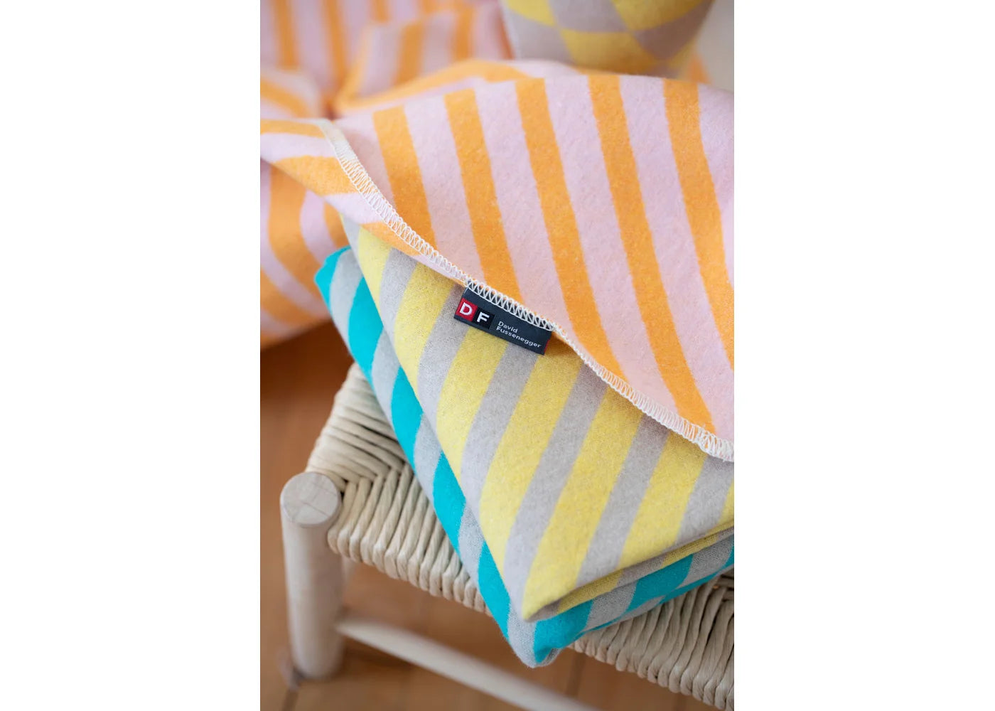 Soft cotton baby blankets with orange and yellow diagonal stripes, adding einzigartig Wohndeko and individueller Stil as. - JUWEL Babydecke Diagonalstreifen orange