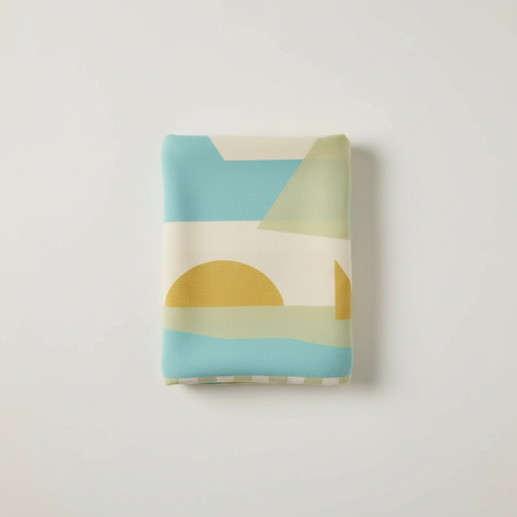 Folded baby blanket in soft cotton with abstract green, blue, and yellow pattern, einzigartig Wohndeko for individueller. - JUWEL Babydecke Abstrakt hellgrün