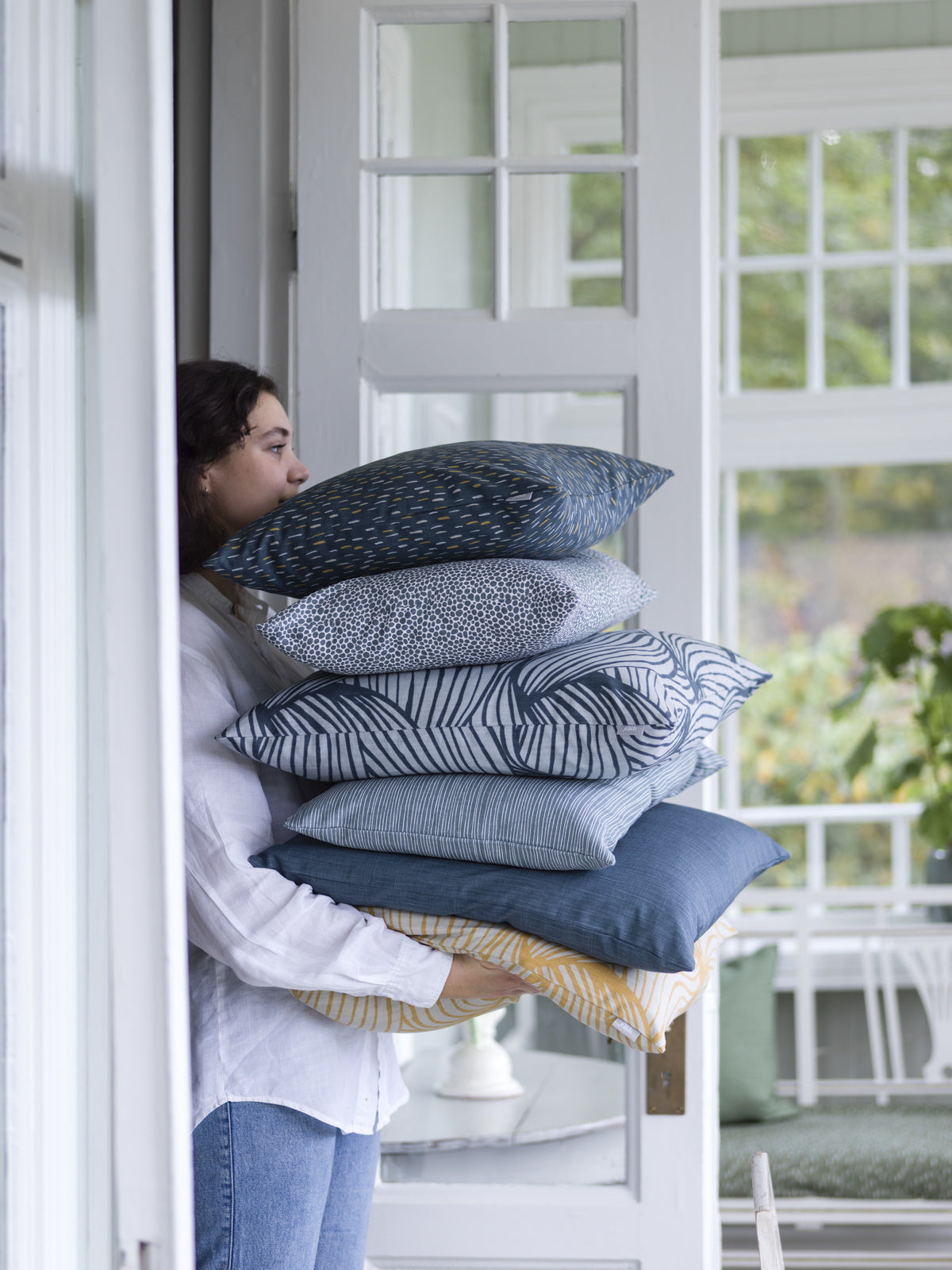 Stack of uniquely designed blue cushion covers with various patterns, perfect for individueller Stil and Wohndeko. - ART Cushion Cover blue 50