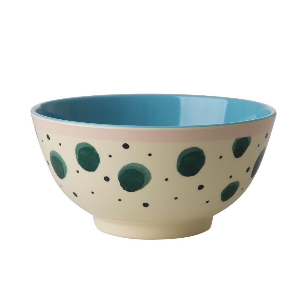 Melamine bowl with turquoise interior and beige exterior decorated with large teal dots and small black speckles,. - Melamine Bowl Watercolor Splash